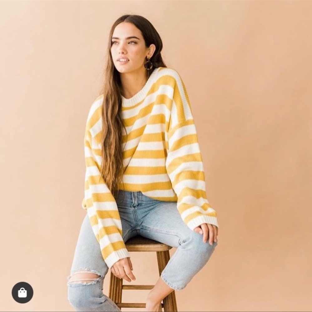 Yellow cable knit sweater